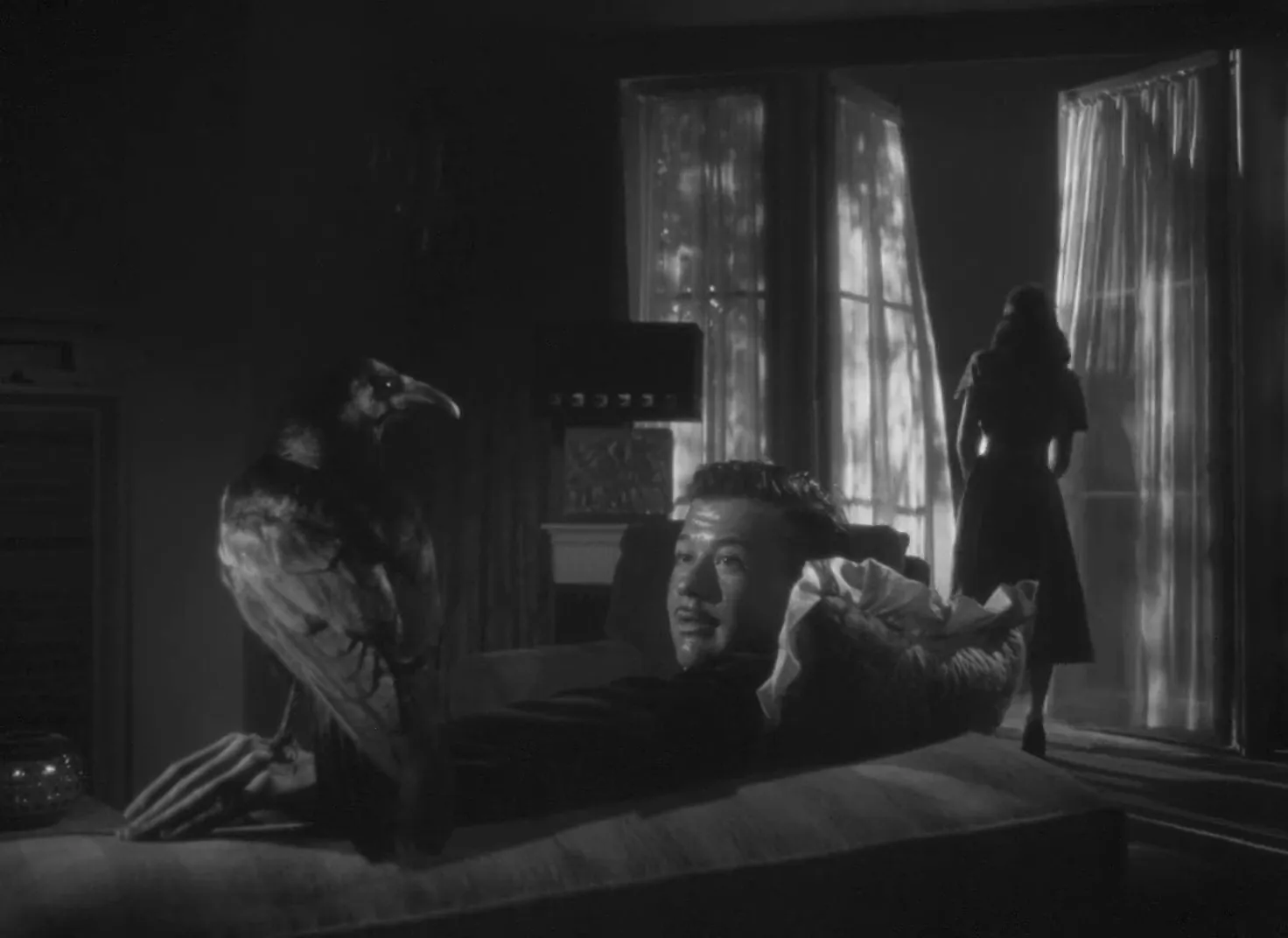 Janet opens the window—an image of escape and the film’s final moral breeze