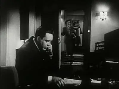 Frank on the phone with Paula, the voice of his home life