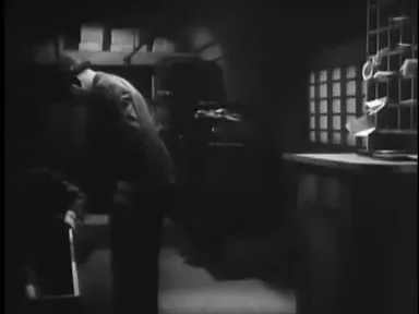 Officers pry open a trunk in search of evidence during the climax