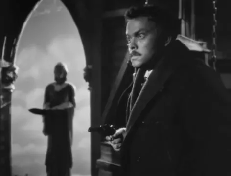 The belfry at night: a confined, symbolic arena for the film's moral confrontation.