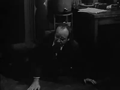 Johnny Williams finds Bard's body wrapped in a coat in the press room closet