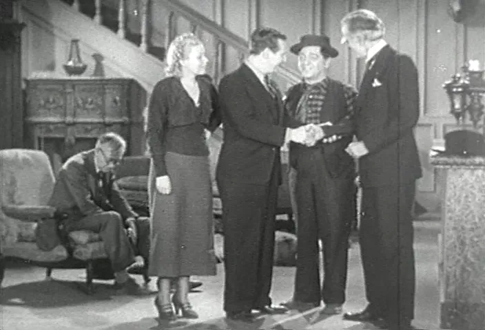 The justice of the peace arrives and the film moves toward its final formalities