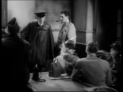 Stationmaster recounting the old bridge accident; the ghost story's origin