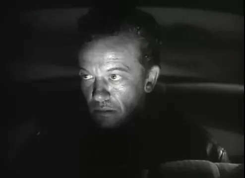 Myers reveals himself in the car, a tense close-up moment