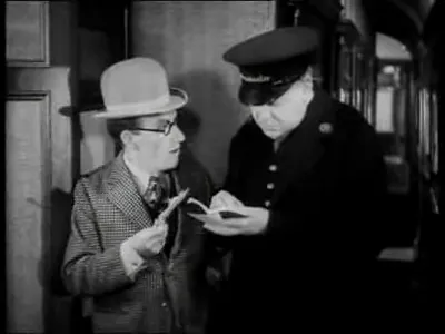 Tommy Gander (Arthur Askey) introducing himself, comic encounter on the train