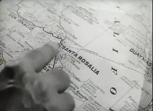 Map spread on the car hood as Myers plots the route to Santa Rosalia
