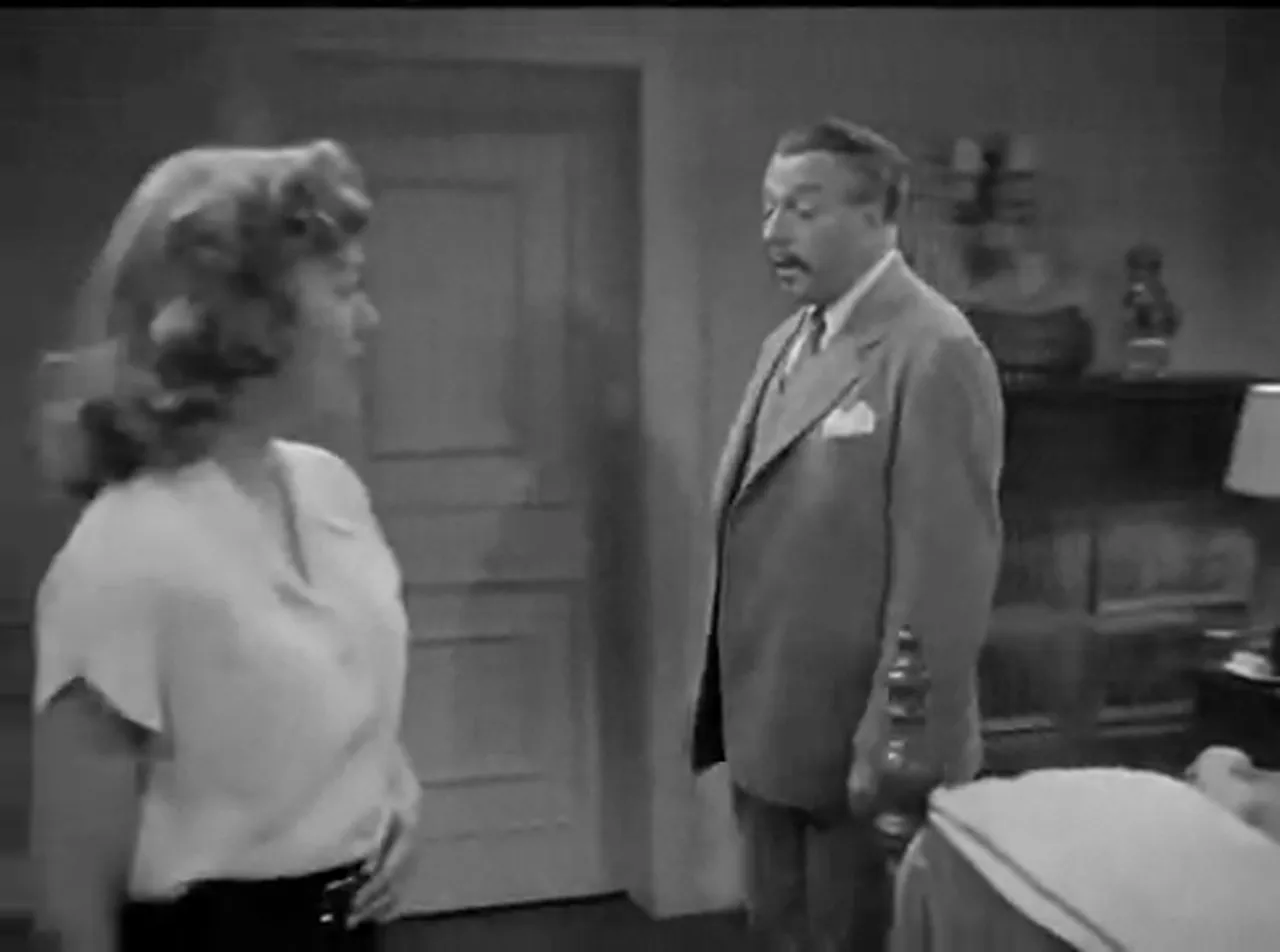 Charlie Chan enters the Manning ranch alone to avoid suspicion