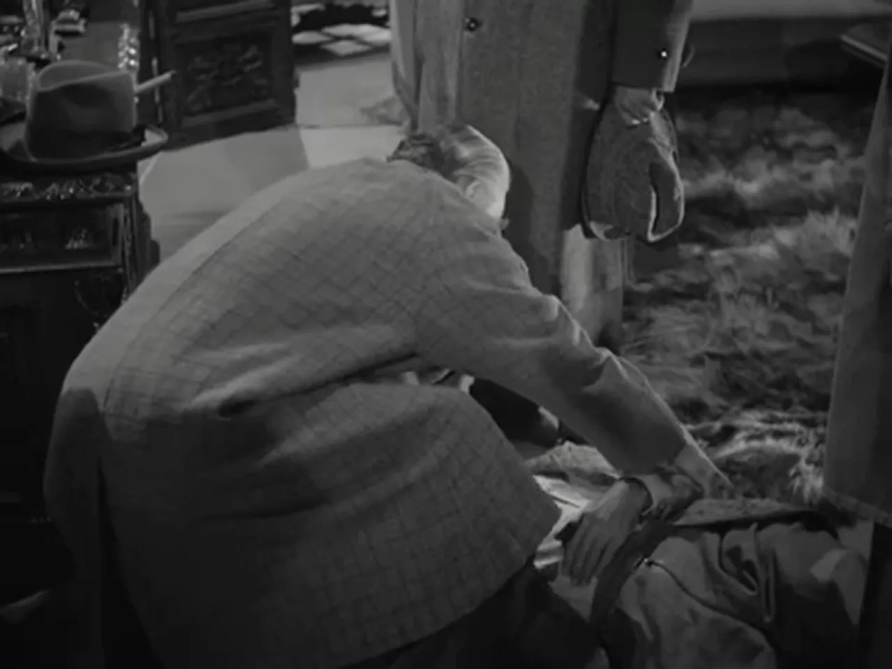 Inspector Gregson examining Sir George Fenwick’s body and the scene of the murder