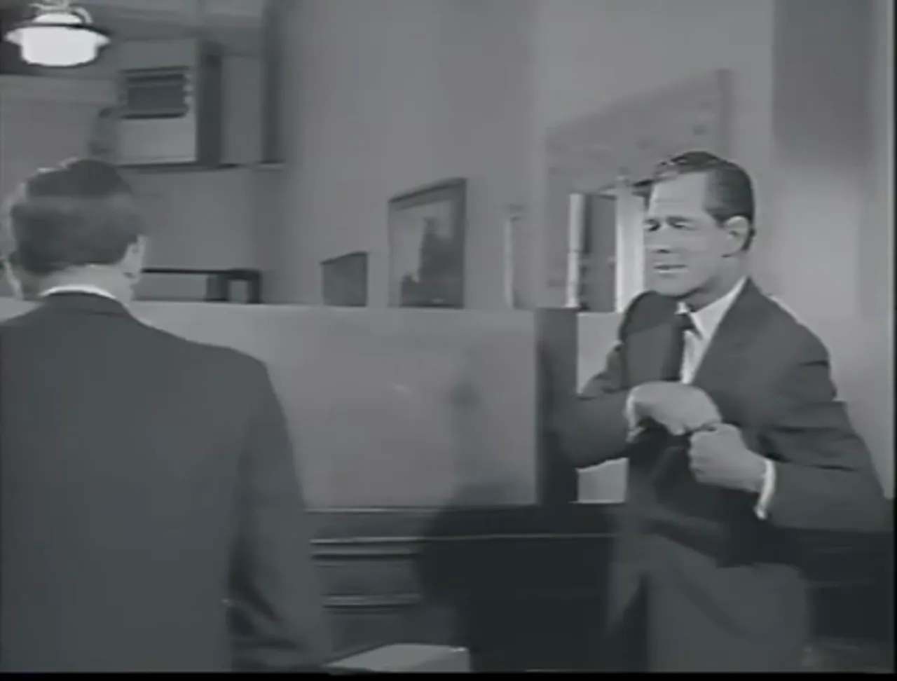 The camera at the bank: film noir movie technique favors close quarters and moral confrontation.