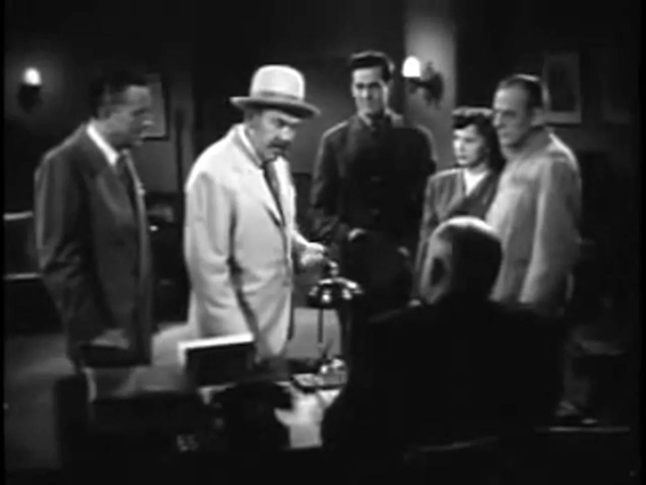 The confrontation in the warehouse — the film noir movie reaches its moral and narrative resolution.