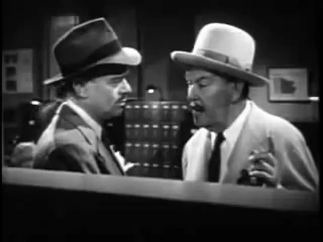 Technical demonstration of forged fingerprints — the film noir movie's central forensic scene.
