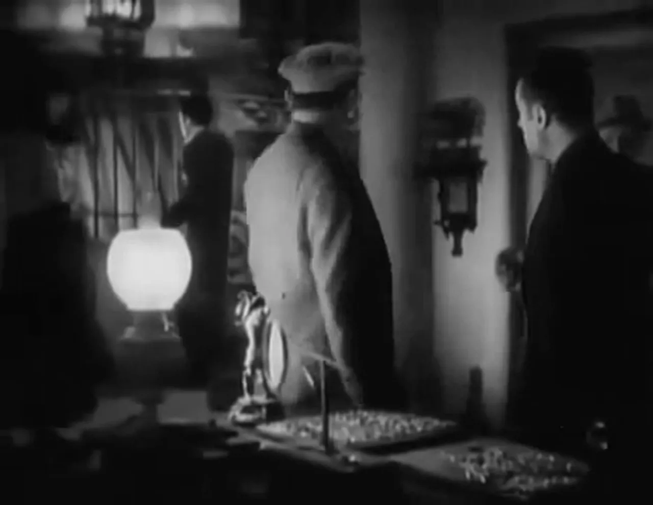 Raid on the Casbah; police surround Grandpere's house