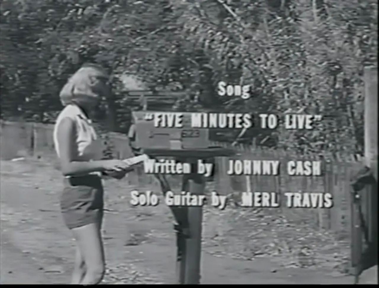 Johnny Cabot holed up in a motel; the film noir movie establishes exile and waiting.