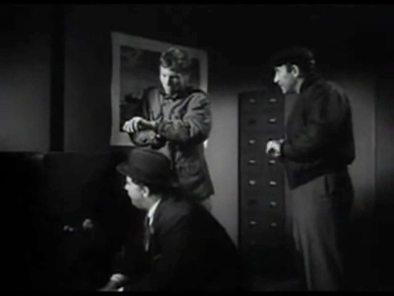 Harry and his crew preparing to get the cash from the warehouse