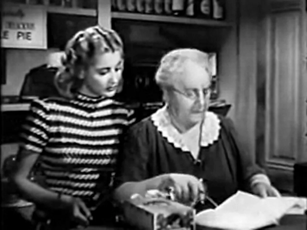 The sign-in book and the cabin assignment—the small civic rituals of the film noir movie
