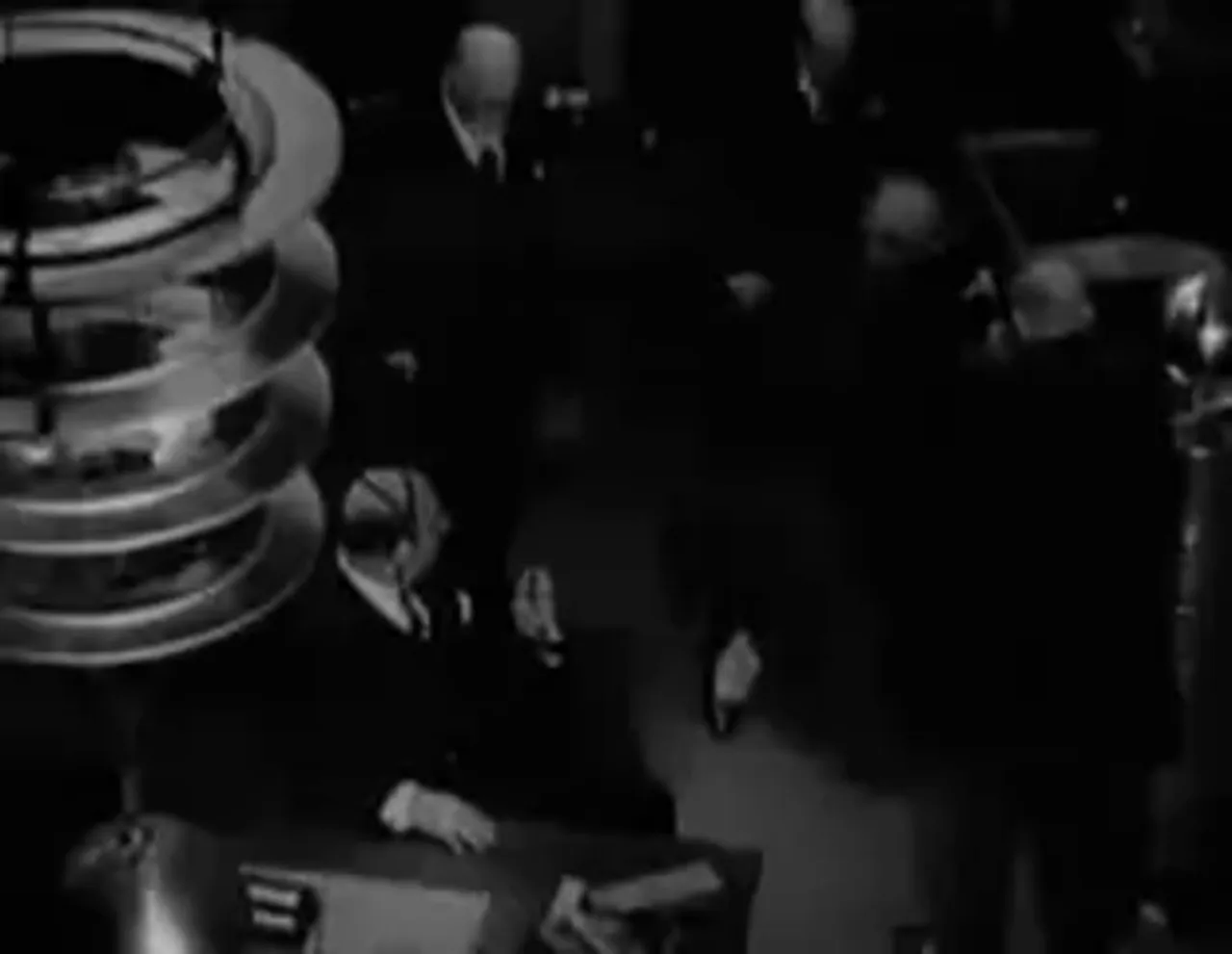 Captain Holling appears among the passengers, a shock to those who believed him absent
