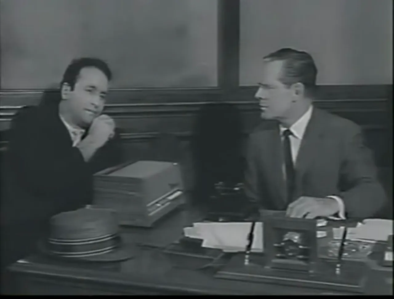 Fred Dorella raises the stakes at the bank with the $70,000 ransom demand.