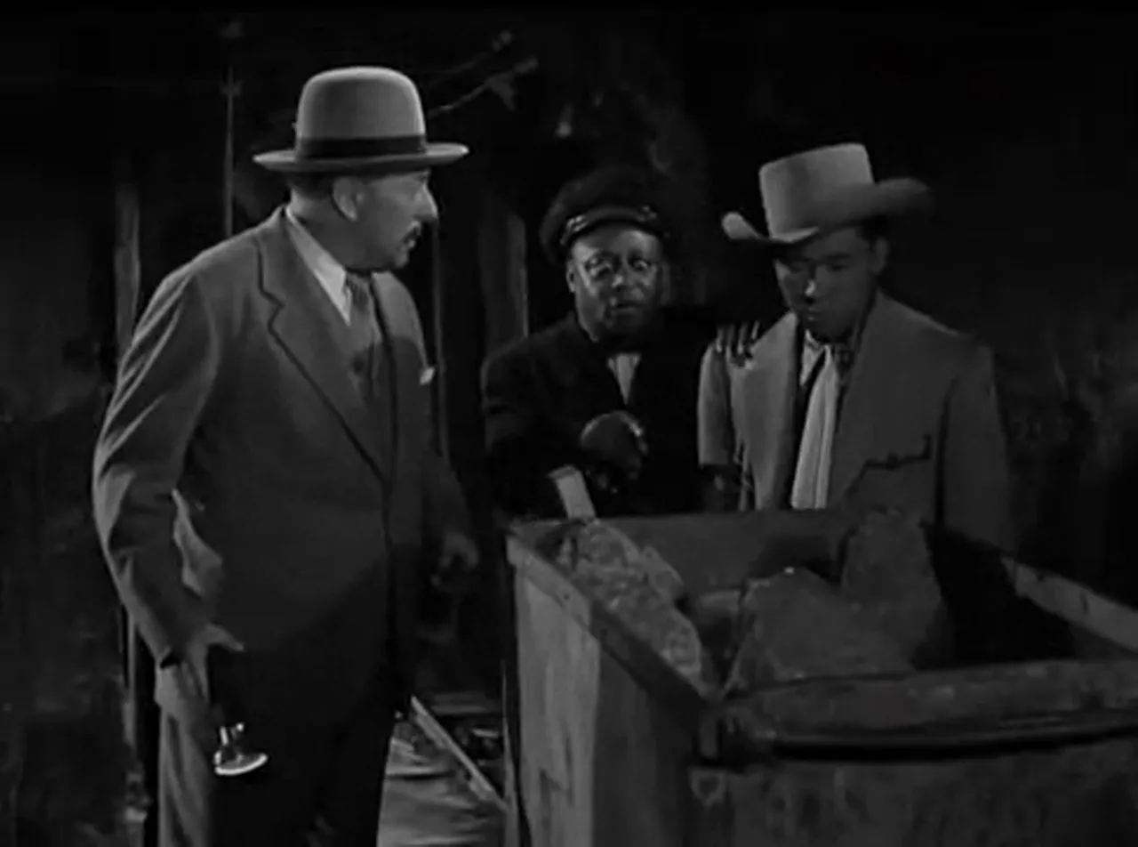 Charlie and associates spot a body in the mining cart during the tunnel search