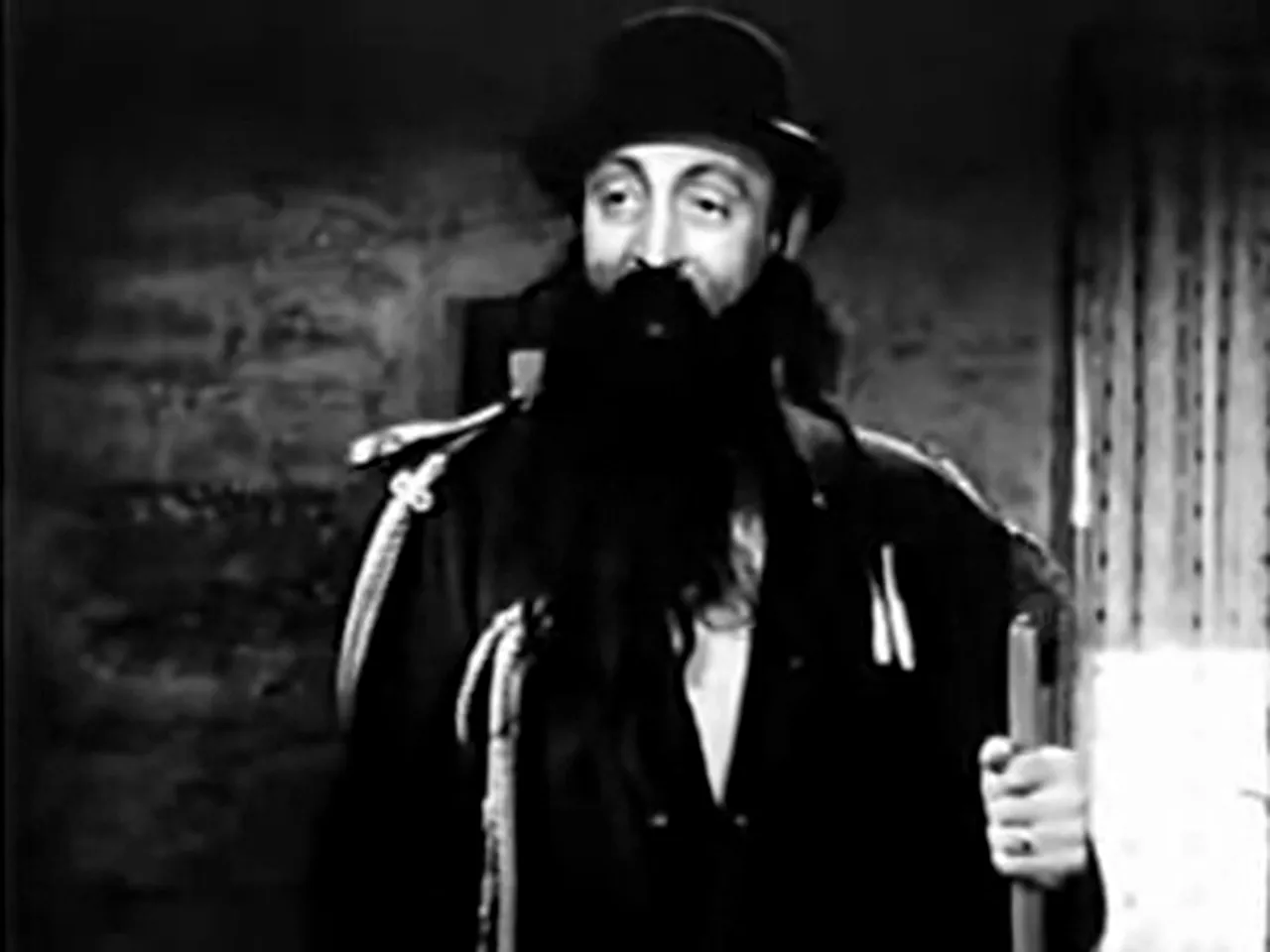 Mischa Auer's Alec Shaw rehearses his act—comic relief in the film noir movie