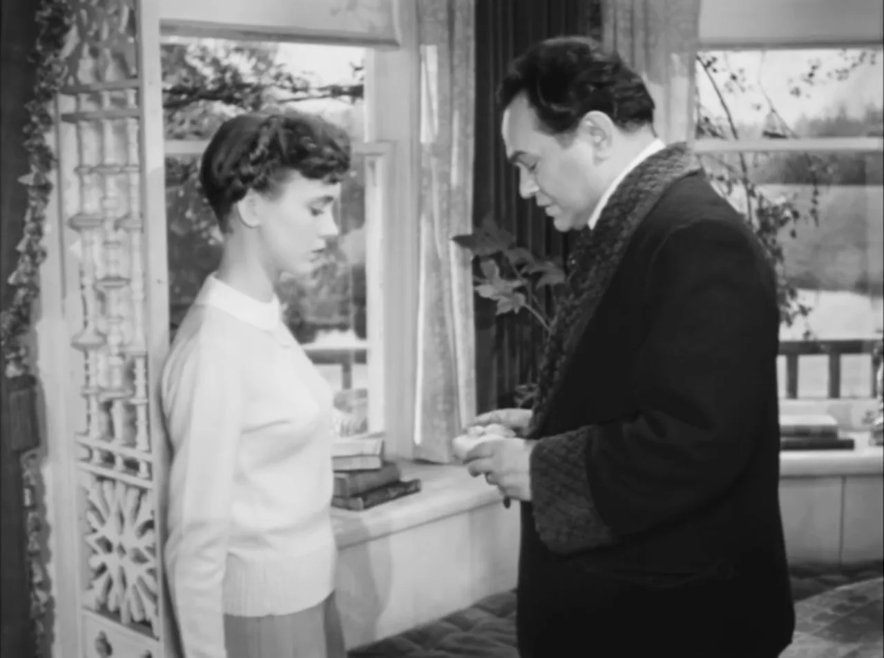 A quiet gift exchange—the film’s small domestic moments among larger anxieties