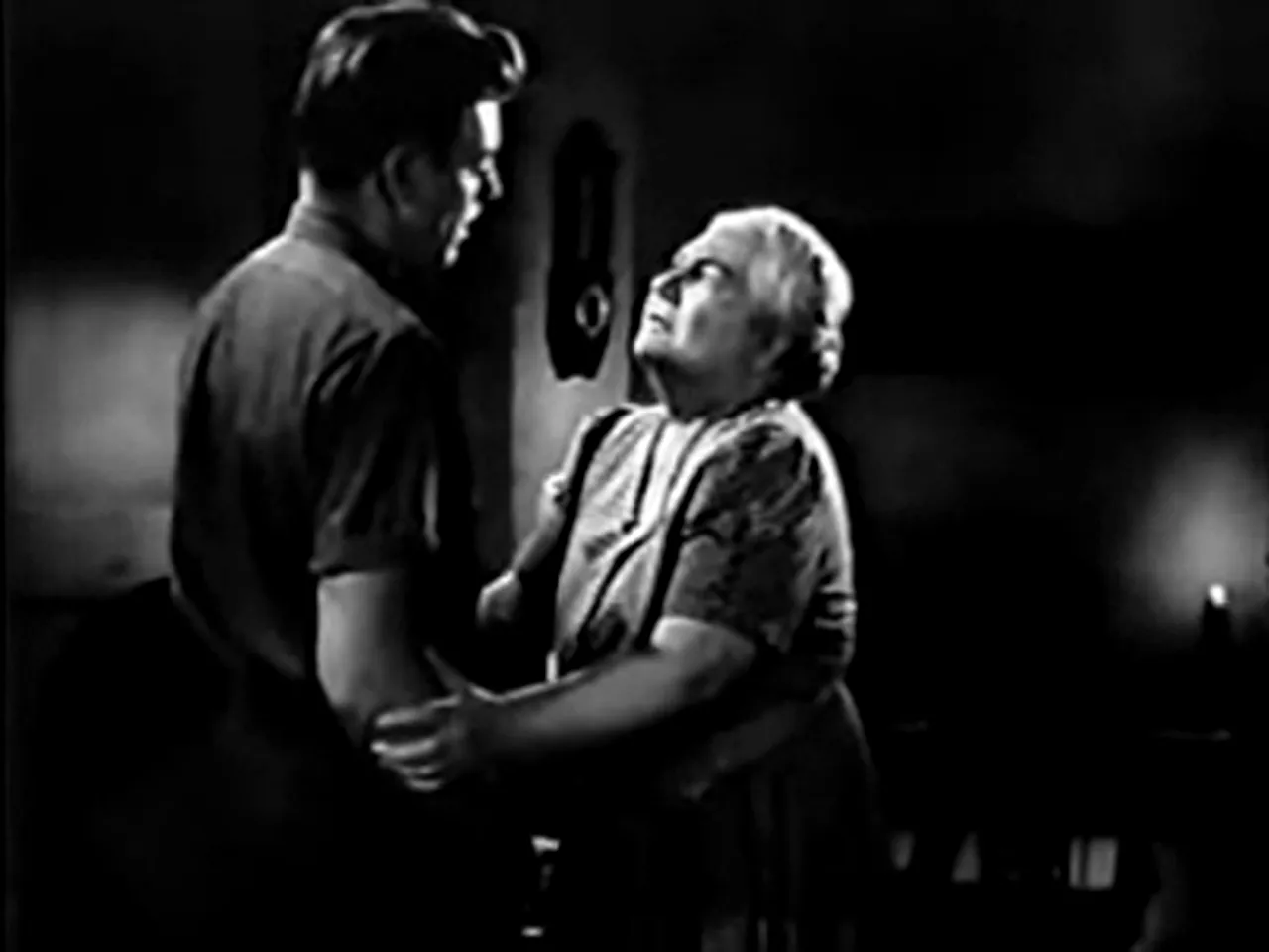 Maggie tells Johnny there's something to reach for—a pivotal emotional moment in the film noir movie