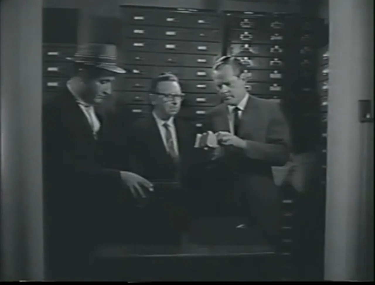 Counting out the cash: the film noir movie’s cash-stuffed briefcase is a central prop.