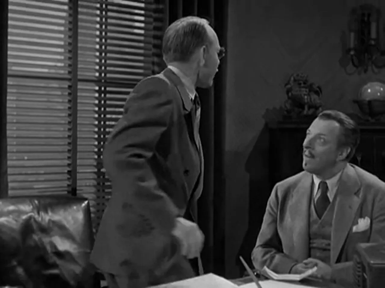 Close‑up of bank documents and the Kelso check