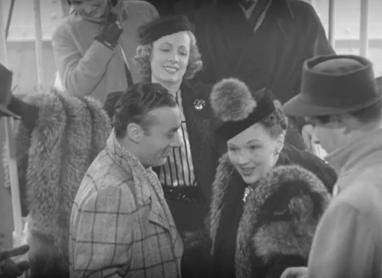 Michel returns to America and is greeted